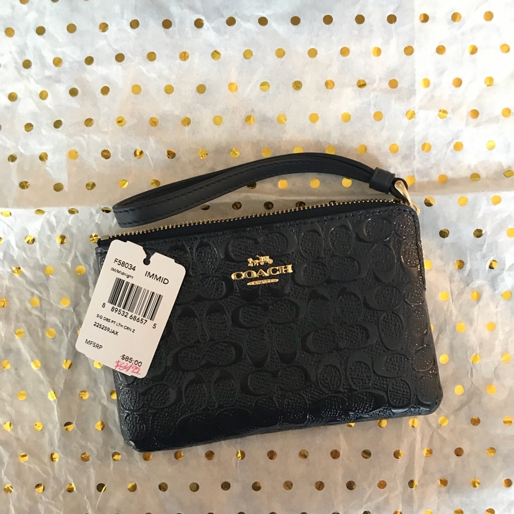 NWT Coach Debossed Navy Wristlet